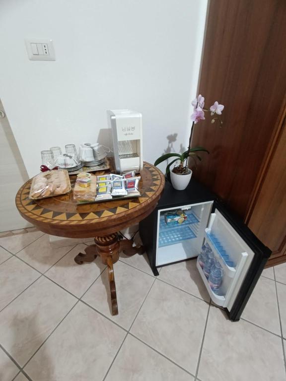 Příslušenství pro přípravu čaje a kávy v ubytování Casa Iole