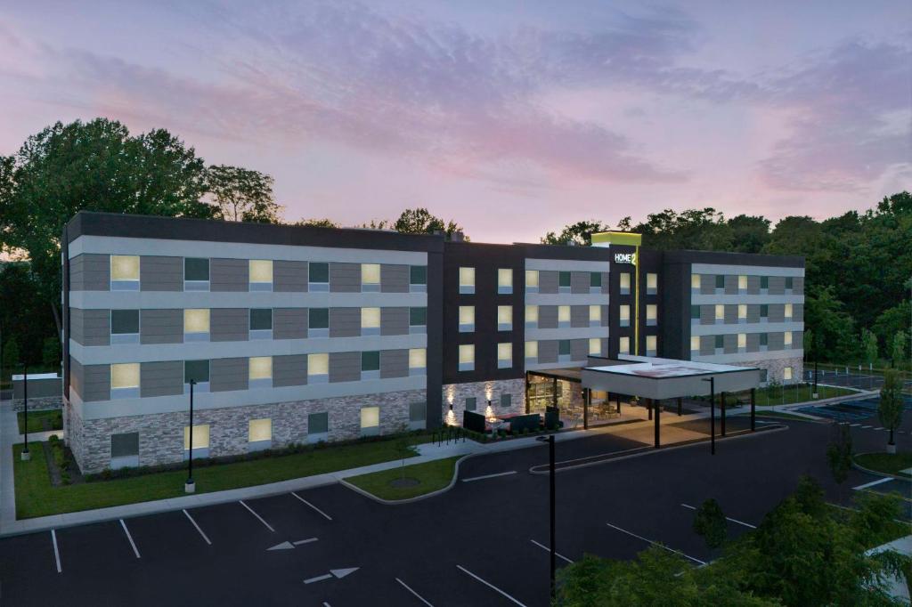 una rappresentazione di un edificio con parcheggio di Home2 Suites By Hilton Poughkeepsie a Poughkeepsie