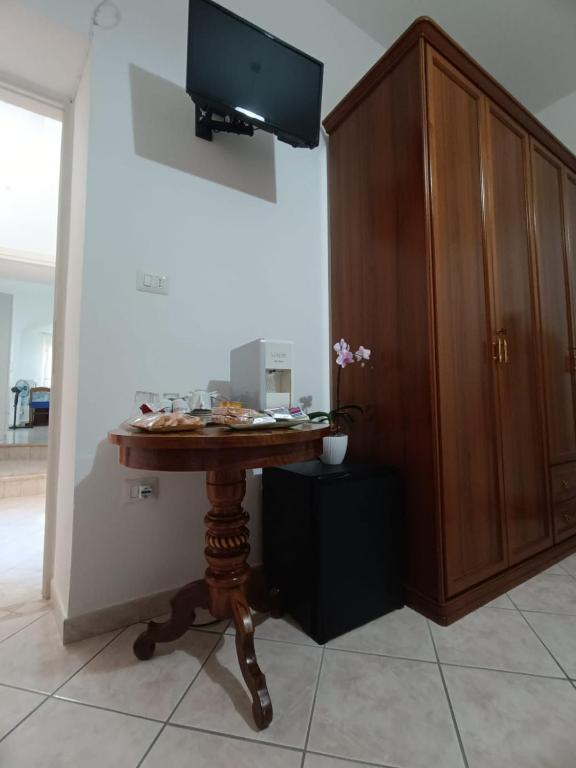 TV a/nebo společenská místnost v ubytování Casa Iole