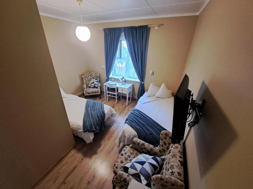 Postel nebo postele na pokoji v ubytování Paide B&B