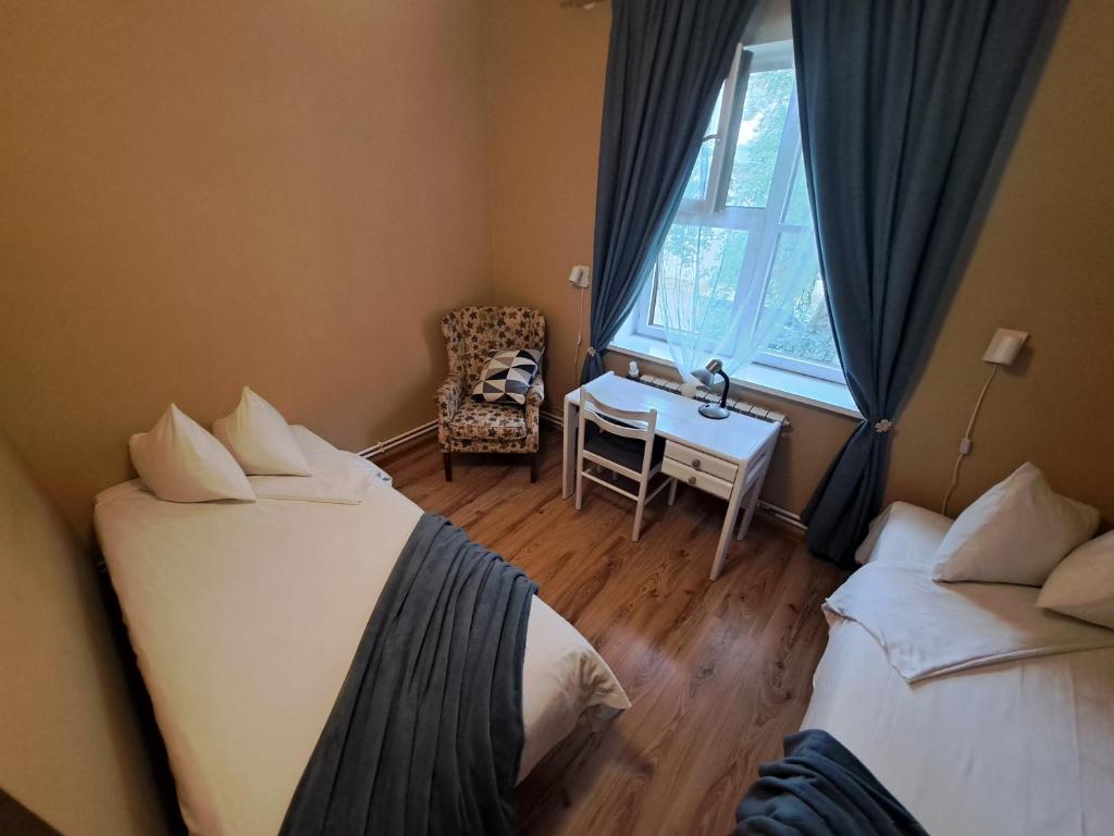 Postel nebo postele na pokoji v ubytování Paide B&B