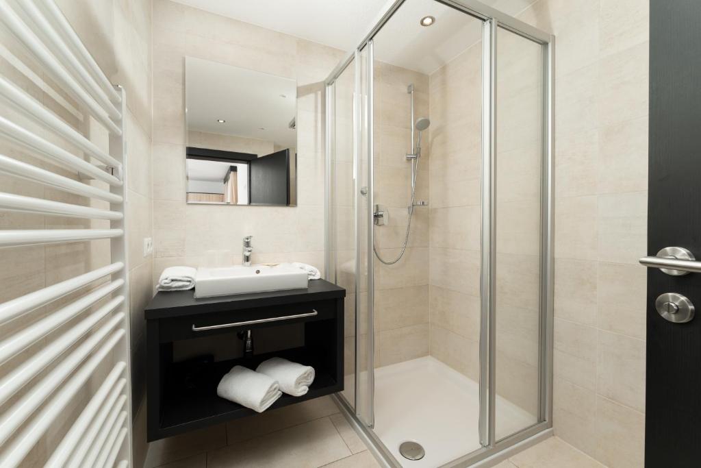 A bathroom at A CASA Opal Appartements