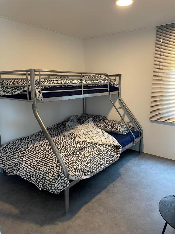 Postel nebo postele na pokoji v ubytování Camping Engelbert (Groningen)