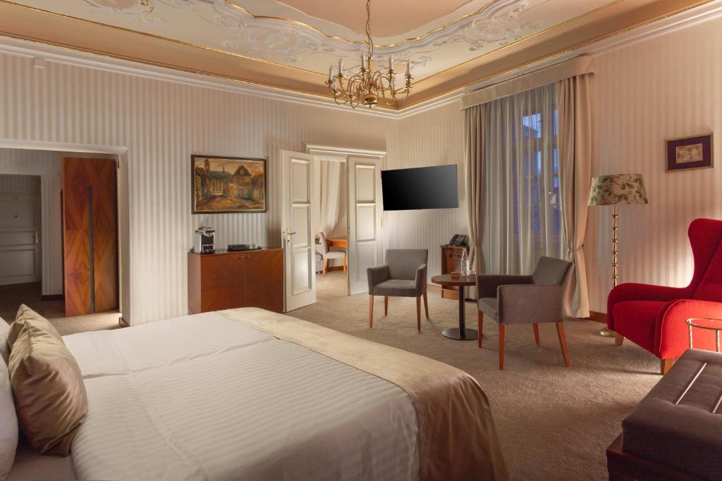 Postel nebo postele na pokoji v ubytování Hotel Pod Věží
