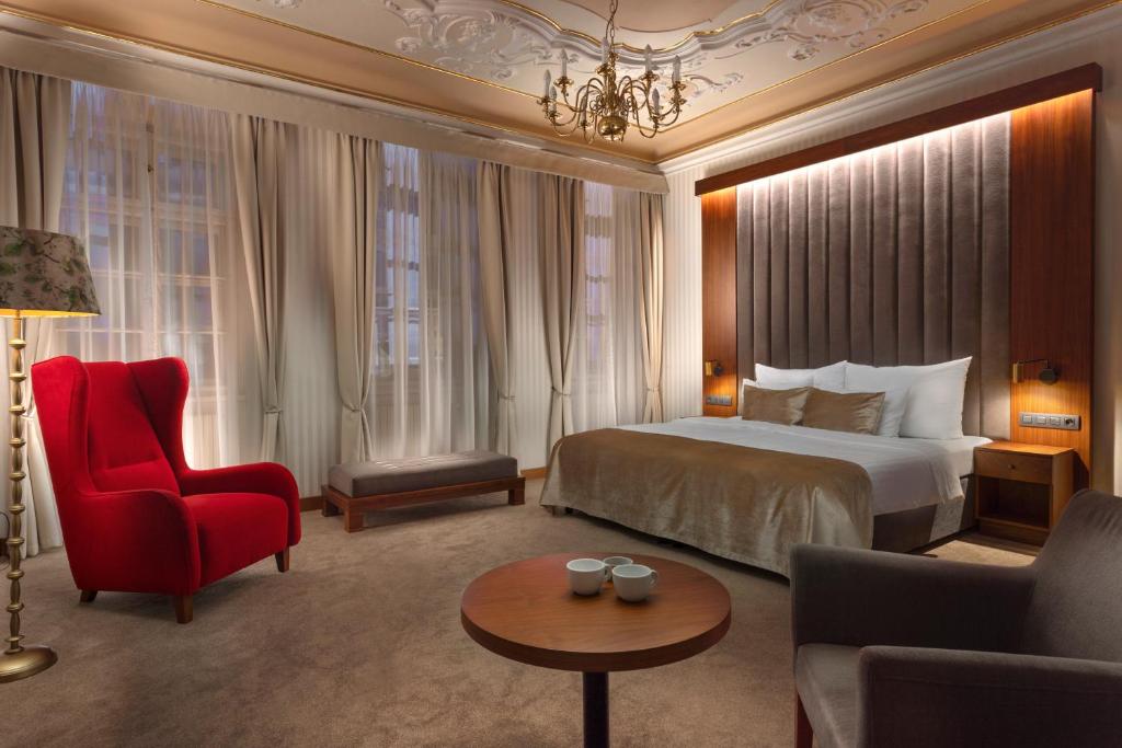 Postel nebo postele na pokoji v ubytování Hotel Pod Věží
