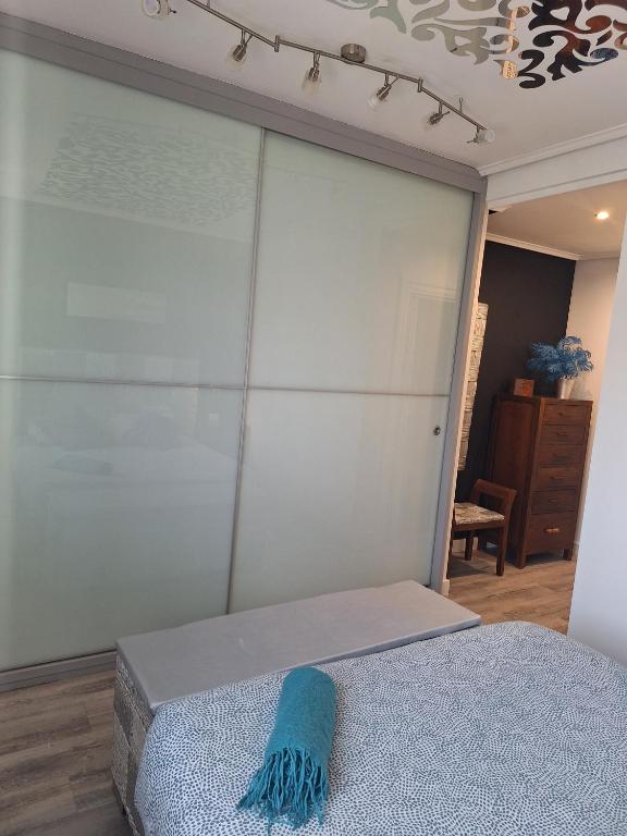 A bed or beds in a room at Intxaurti Etxea