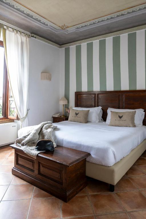 Postel nebo postele na pokoji v ubytování Al Castello Resort