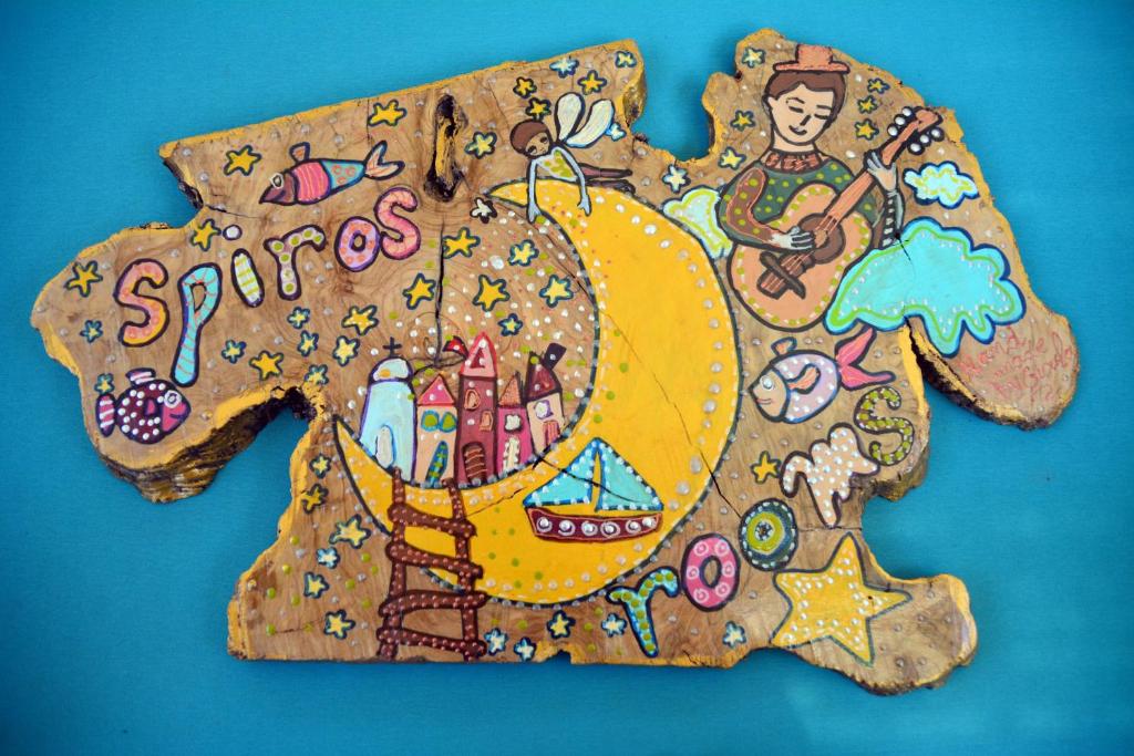 a gingerbread bear shaped cookie with the word spritz at Spiros Rooms in Panormos Skopelos
