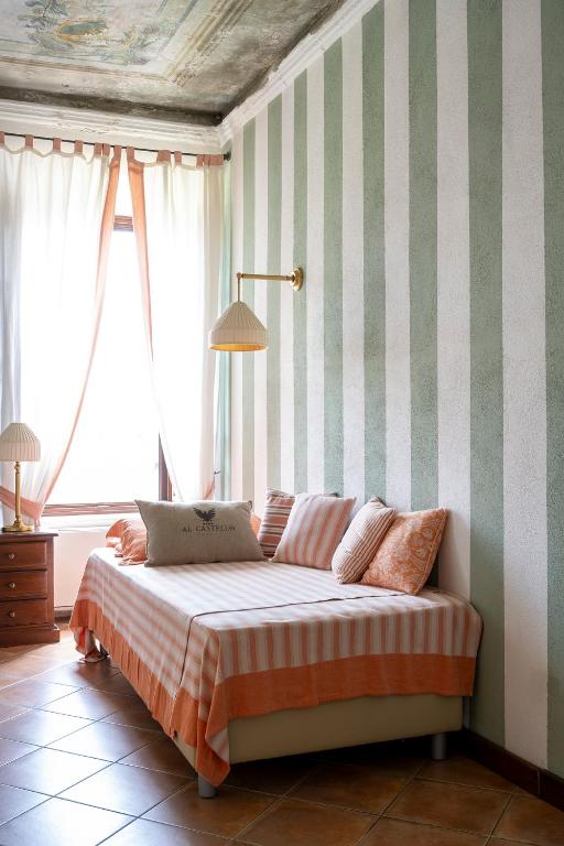 Postel nebo postele na pokoji v ubytování Al Castello Resort