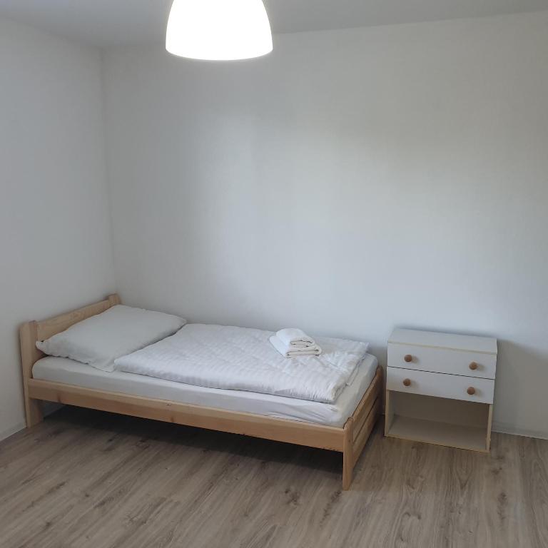 Postel nebo postele na pokoji v ubytování Apartmán Stará Myjava