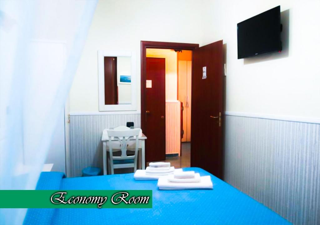 Telewizja i/lub zestaw kina domowego w obiekcie Bed & Breakfast Medea