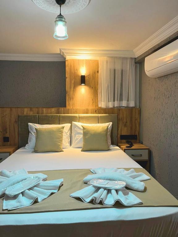Postel nebo postele na pokoji v ubytování Yellow Bull Istanbul hotel