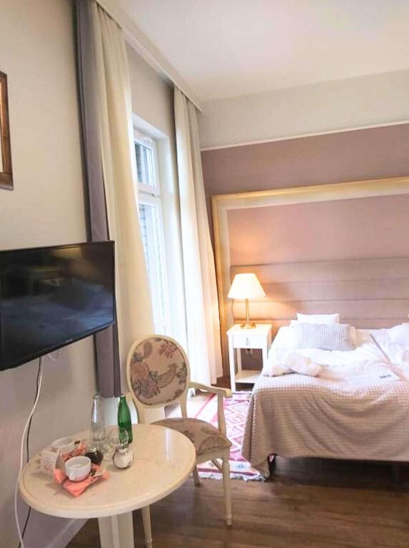 Postel nebo postele na pokoji v ubytování Villa Lessing