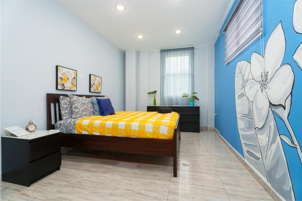 Postel nebo postele na pokoji v ubytování Somos Hotel San Juan