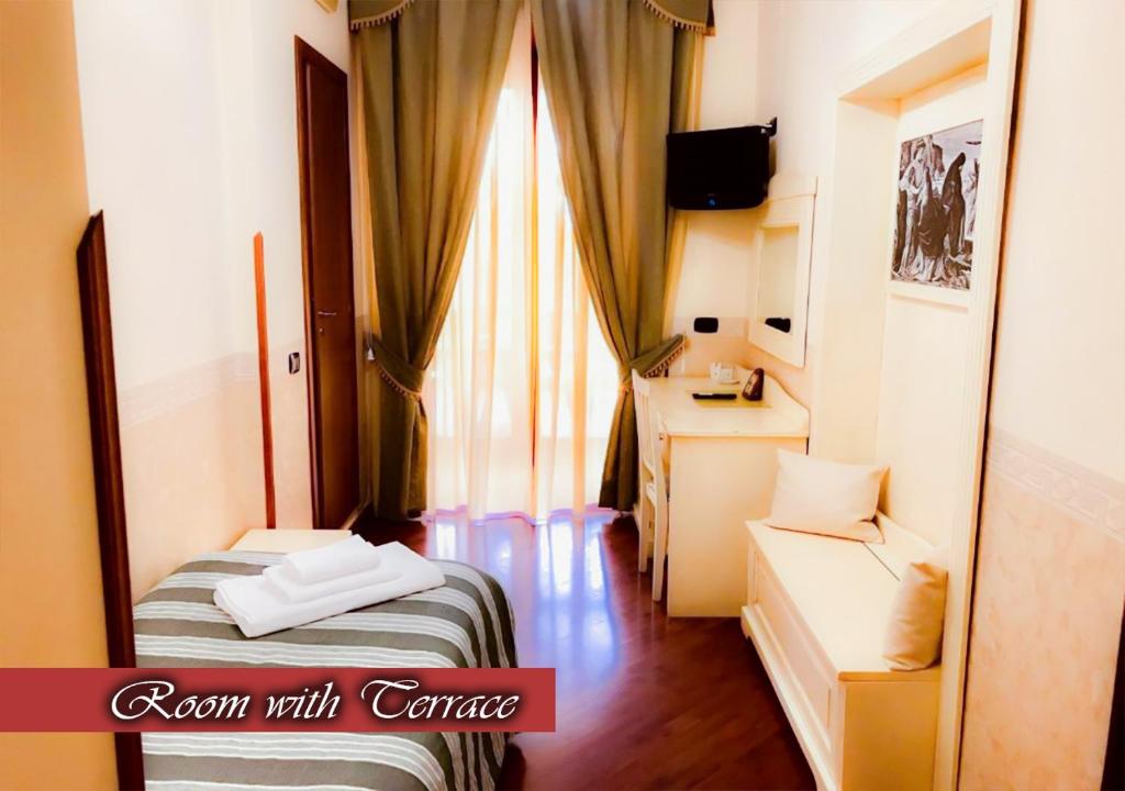 Łóżko lub łóżka w pokoju w obiekcie Bed & Breakfast Medea