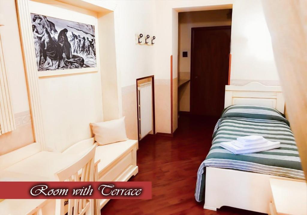 Łóżko lub łóżka w pokoju w obiekcie Bed & Breakfast Medea