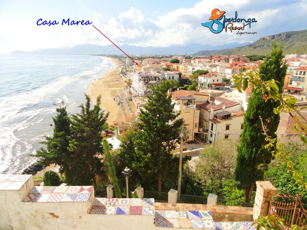 a view of a beach with houses and the ocean at Casa Marea Sperlongaresort apartment in Sperlonga
