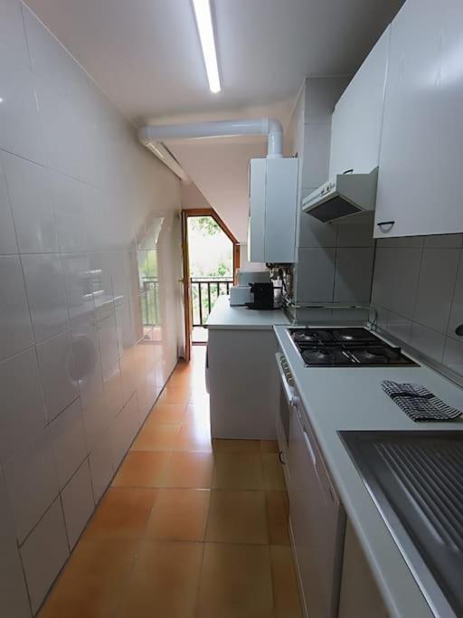 Kuchyň nebo kuchyňský kout v ubytování Balaitus Petfriendly - Arafita Apartamentos