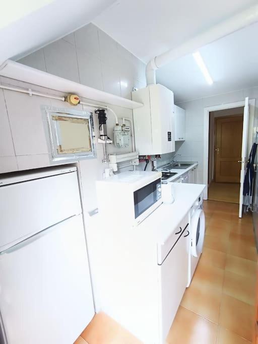 Kuchyň nebo kuchyňský kout v ubytování Balaitus Petfriendly - Arafita Apartamentos