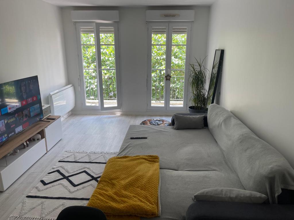 Μια τηλεόραση ή/και κέντρο ψυχαγωγίας στο L'Olympe de Deuil 10 min de Paris 1 min de la gare