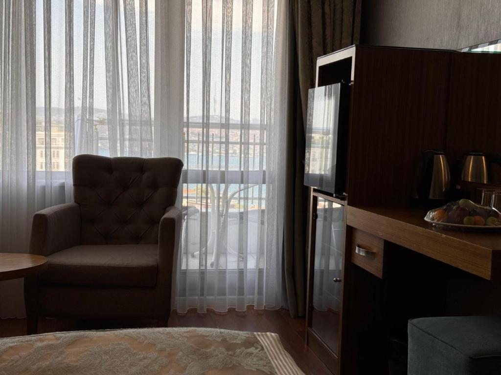A seating area at Grand Star Hotel Premium