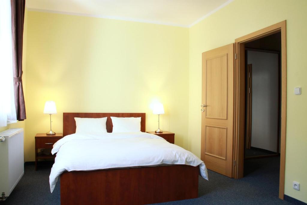 Postel nebo postele na pokoji v ubytování Hotel Vera