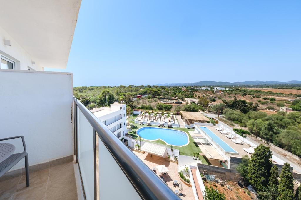 a balcony with a view of a resort at Hotel Ankaa - Adults Only in Porto Cristo