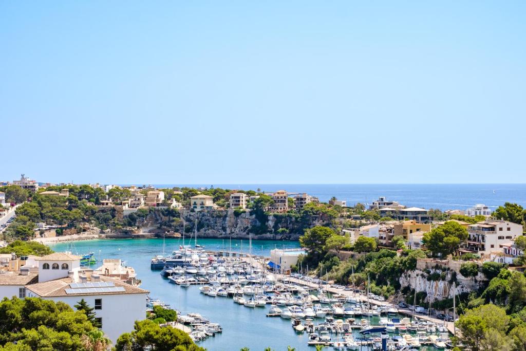 a view of a harbor with boats in the water at Hotel Ankaa - Adults Only in Porto Cristo