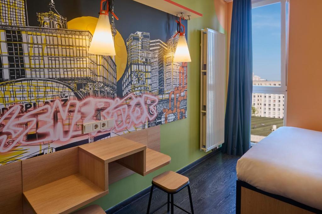 Cama ou camas em um quarto em Generator Berlin Alexanderplatz
