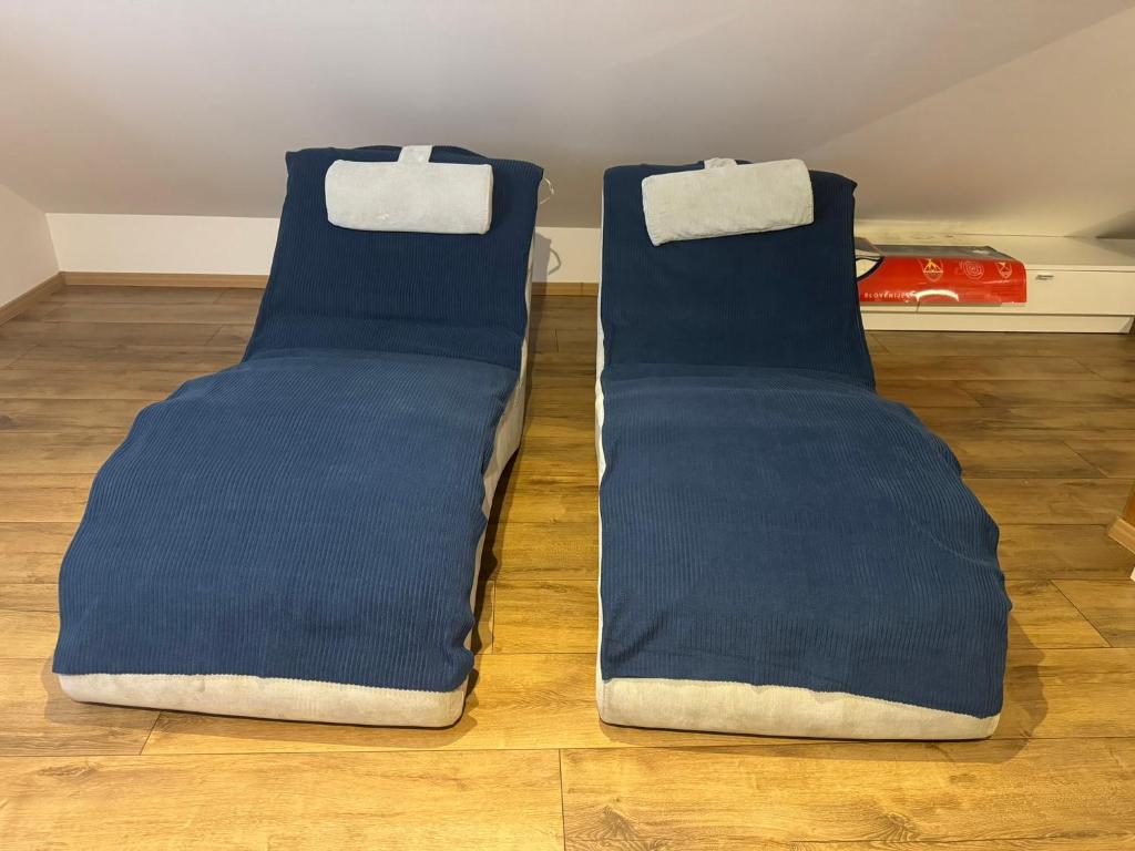 Postel nebo postele na pokoji v ubytování Hiška pri brajdah