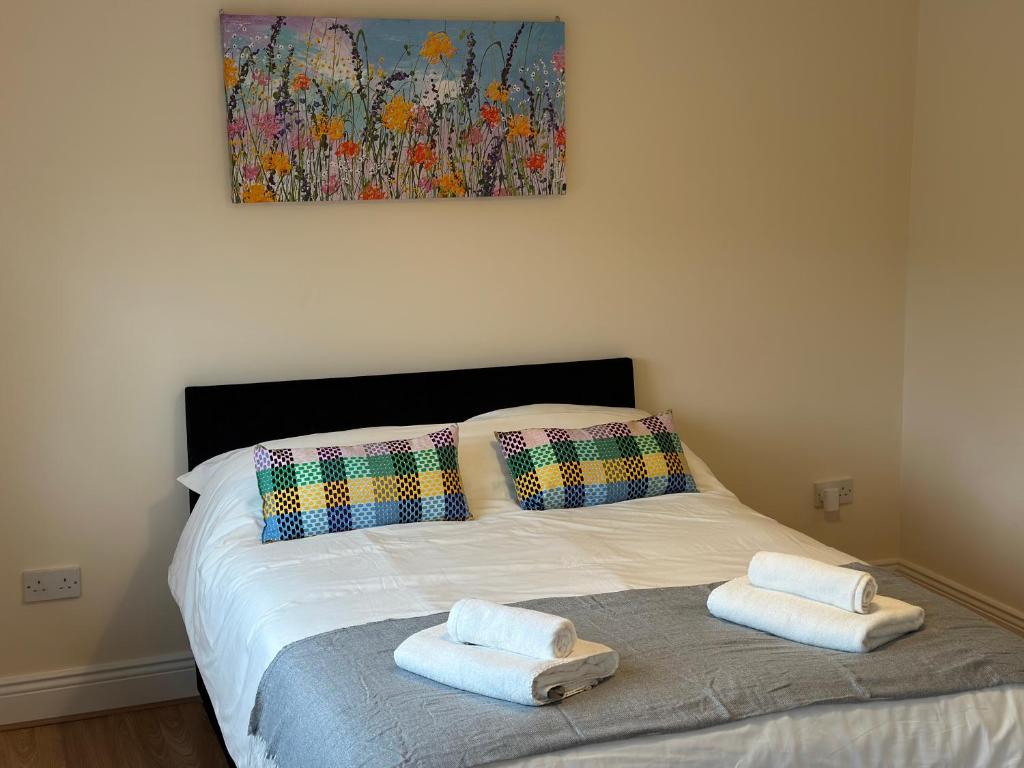 Postel nebo postele na pokoji v ubytování Warm Welcome Rooms