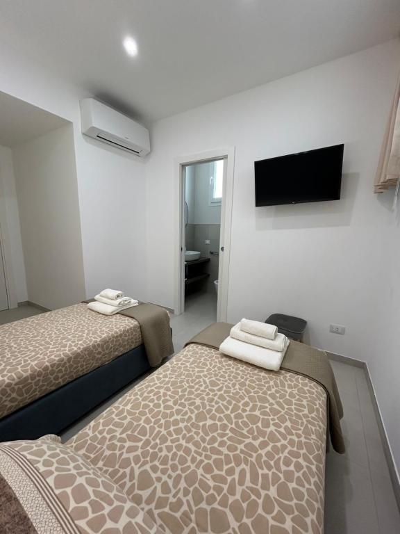 Postel nebo postele na pokoji v ubytování Casa LE VELE