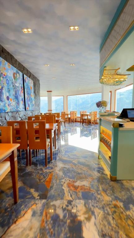 Restaurace v ubytování Luna Volcán, Adventure SPA - formerly Luna Runtún