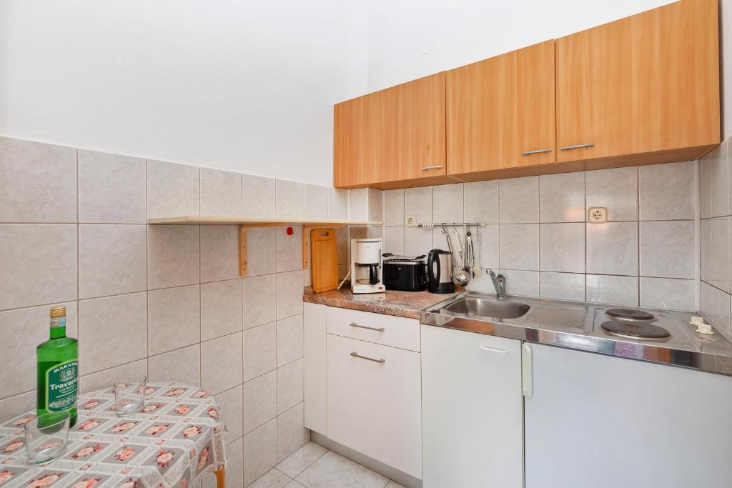 Кухня или мини-кухня в Apartmani Galić 2
