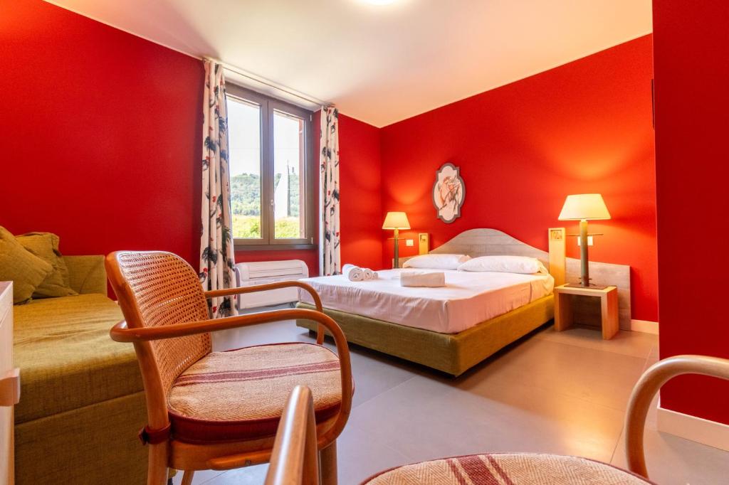 Postel nebo postele na pokoji v ubytování San Giuseppe Suite Lake Como