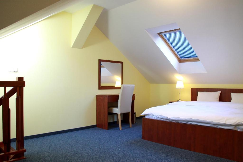 Postel nebo postele na pokoji v ubytování Hotel Vera