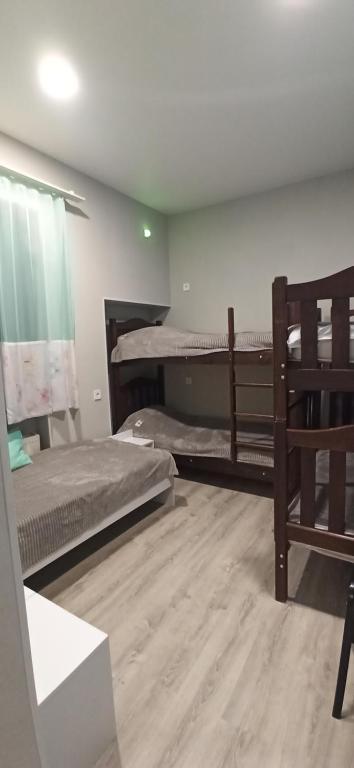 Postel nebo postele na pokoji v ubytování Apartments Lezzet