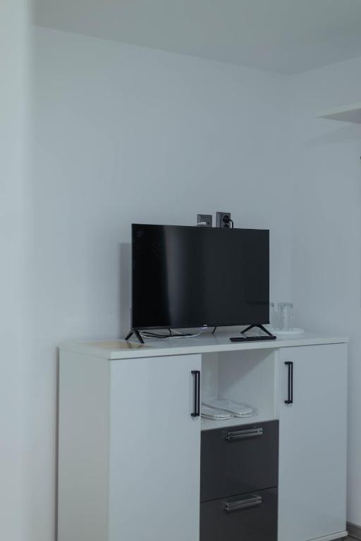 TV a/nebo společenská místnost v ubytování Vila Mario