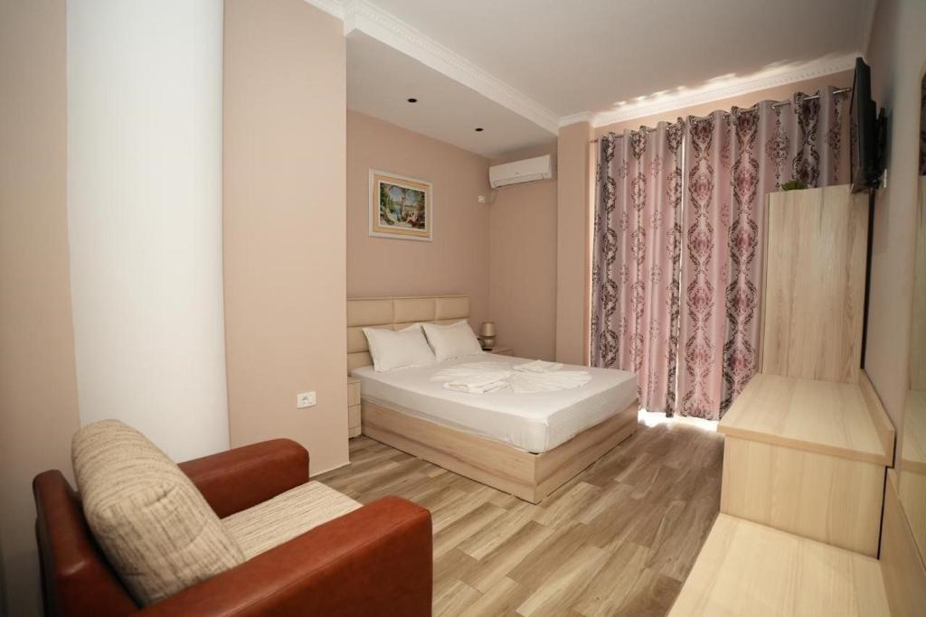 Postel nebo postele na pokoji v ubytování Hotel Kojku