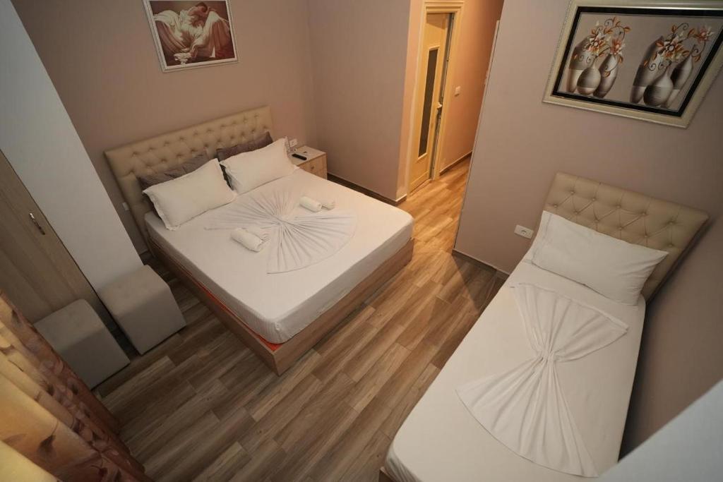 Postel nebo postele na pokoji v ubytování Hotel Kojku