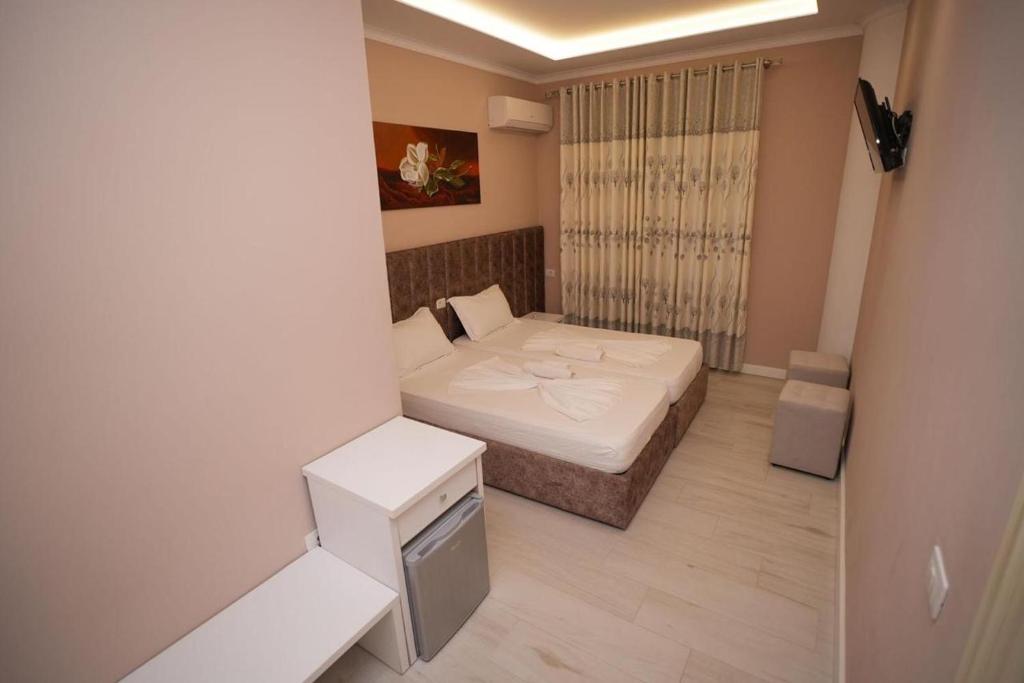 Postel nebo postele na pokoji v ubytování Hotel Kojku
