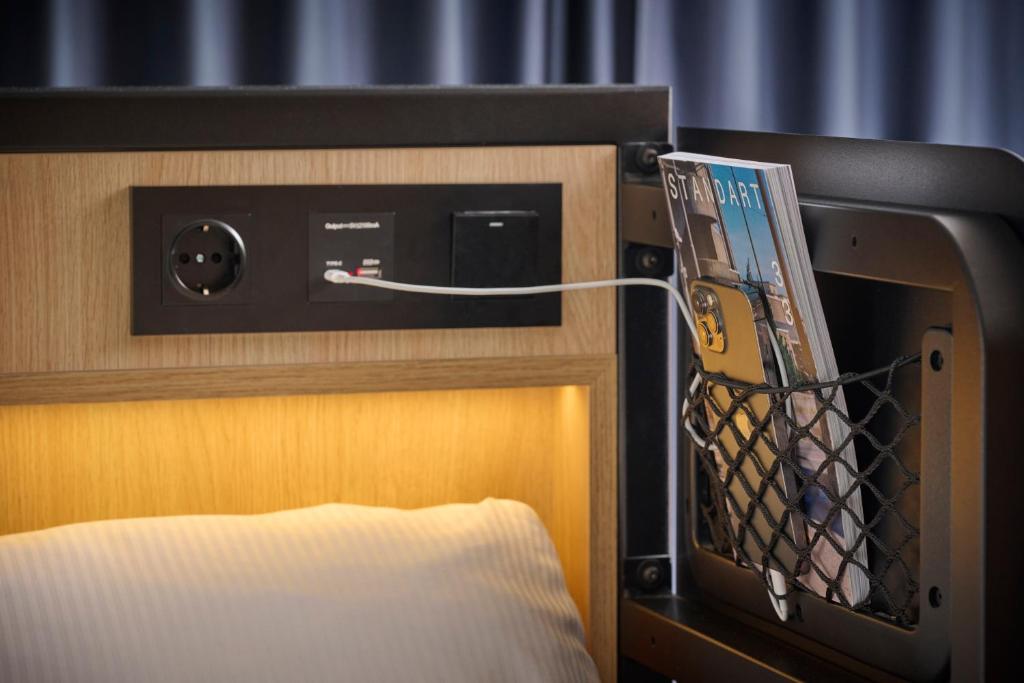 Cama ou camas em um quarto em Generator Berlin Alexanderplatz