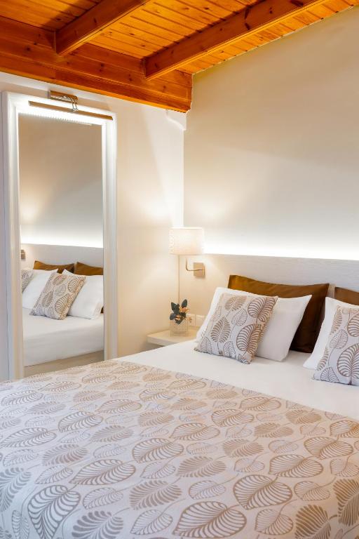 Voodi või voodid majutusasutuse Athos Guest House Pansion toas