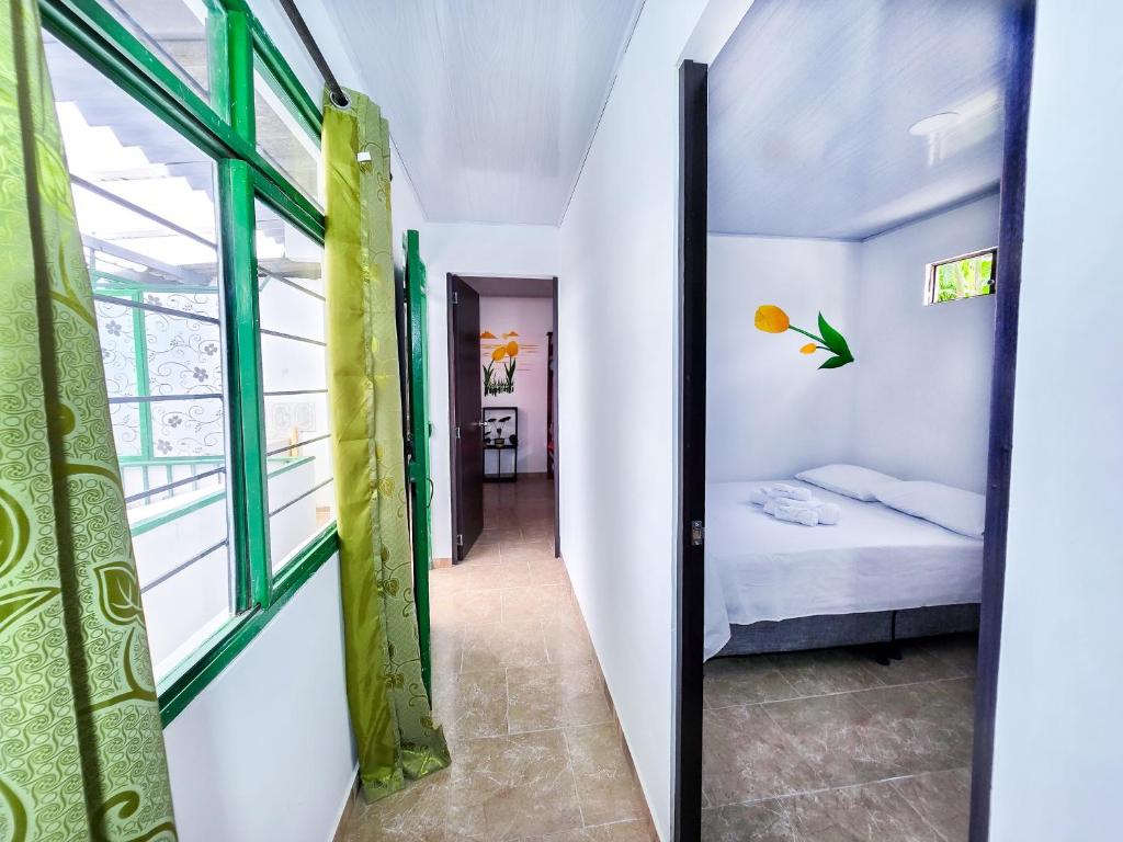Postel nebo postele na pokoji v ubytování Casa Tulipán