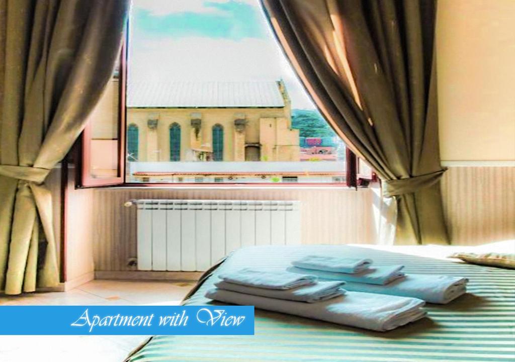 Łóżko lub łóżka w pokoju w obiekcie Bed & Breakfast Medea