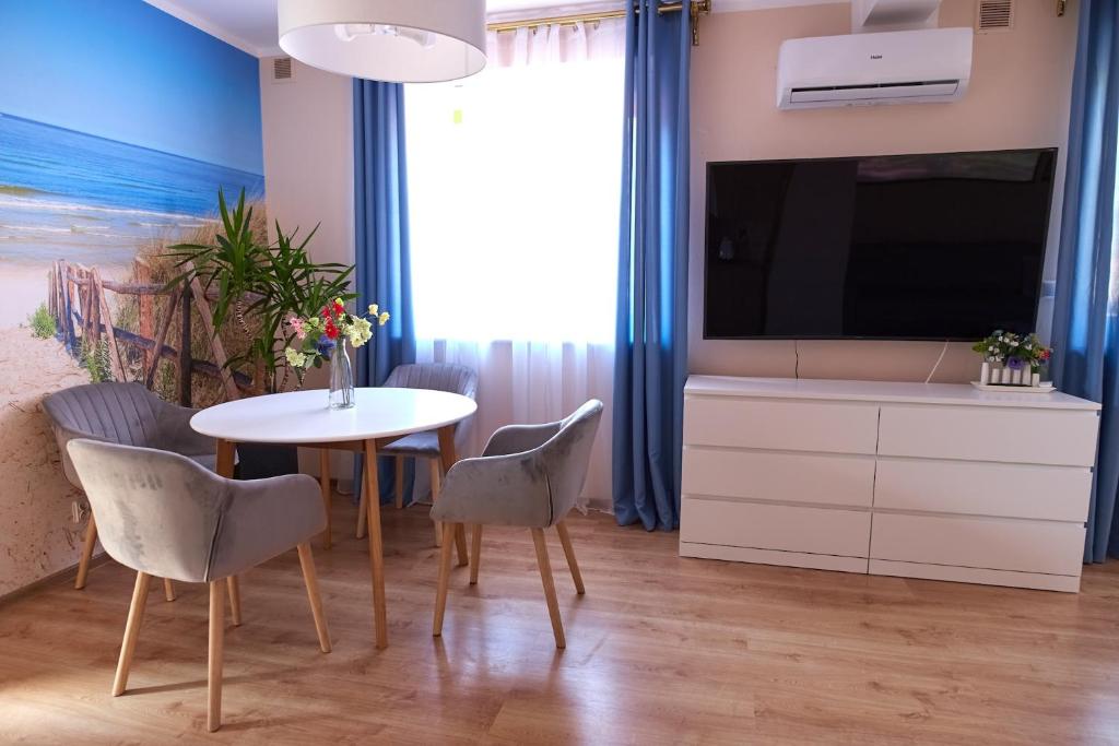 TV a/nebo společenská místnost v ubytování Ośrodek Wypoczynkowy Relaks i Apartamenty