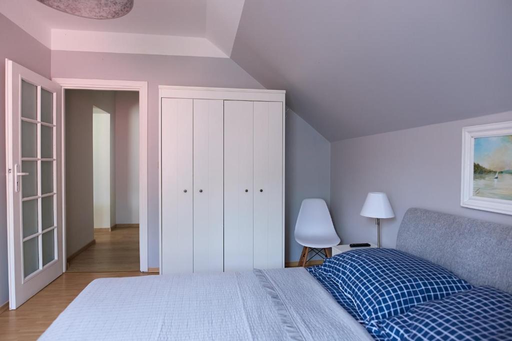 Postel nebo postele na pokoji v ubytování Ośrodek Wypoczynkowy Relaks i Apartamenty