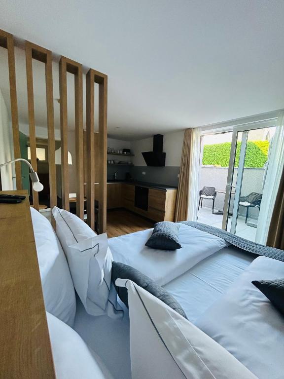 Postel nebo postele na pokoji v ubytování Apartma Neja