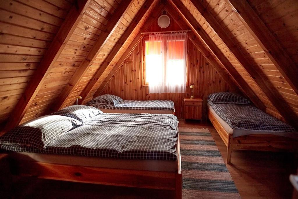 Postel nebo postele na pokoji v ubytování Ośrodek Wypoczynkowy Relaks i Apartamenty