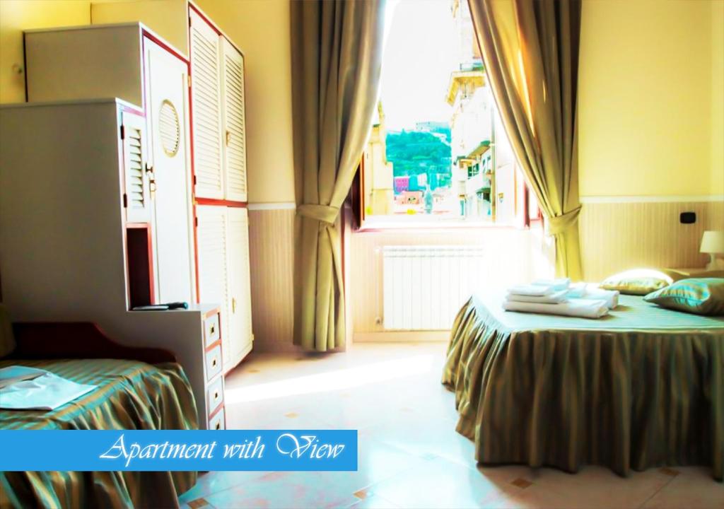 Łóżko lub łóżka w pokoju w obiekcie Bed & Breakfast Medea